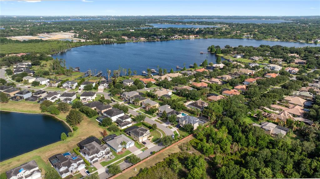 2002 Water Key Drive Windermere, FL 34786 - Photo 52 of 60 a view of a lake with a city