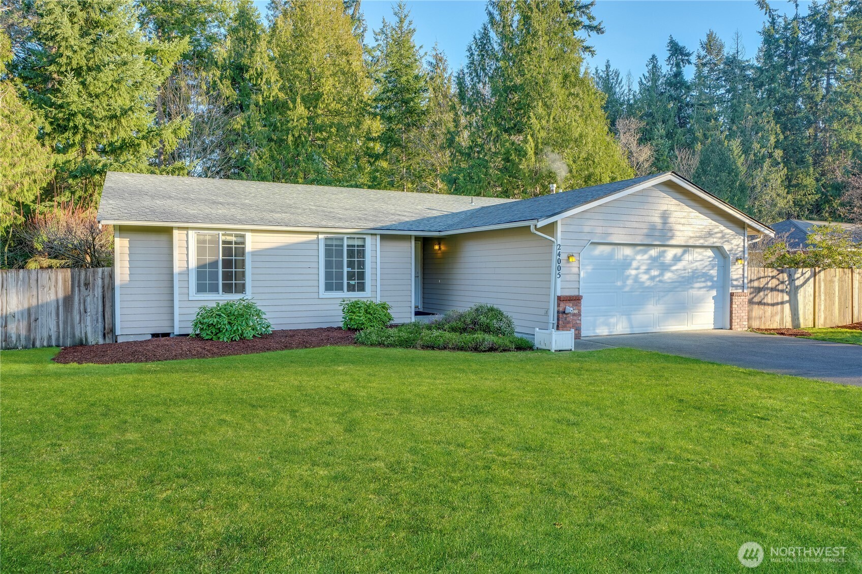 24005 72nd Avenue East Graham, WA 98338 - Photo 1 of 32 a front view of house with yard and green space