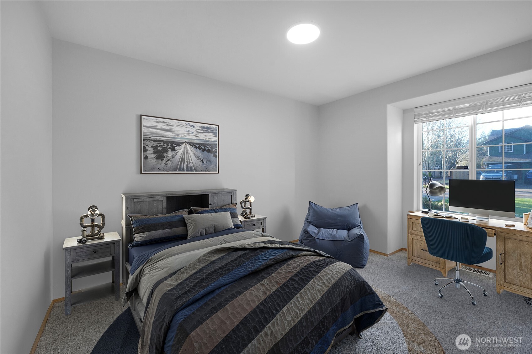 24005 72nd Avenue East Graham, WA 98338 - Photo 19 of 32 a bedroom with a bed and glass door