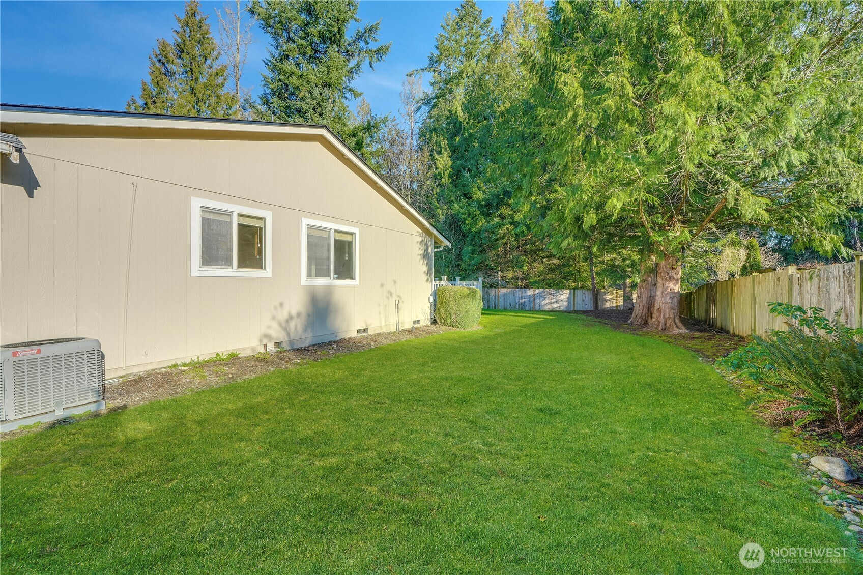 24005 72nd Avenue East Graham, WA 98338 - Photo 29 of 32 a view of backyard with a garden and plants