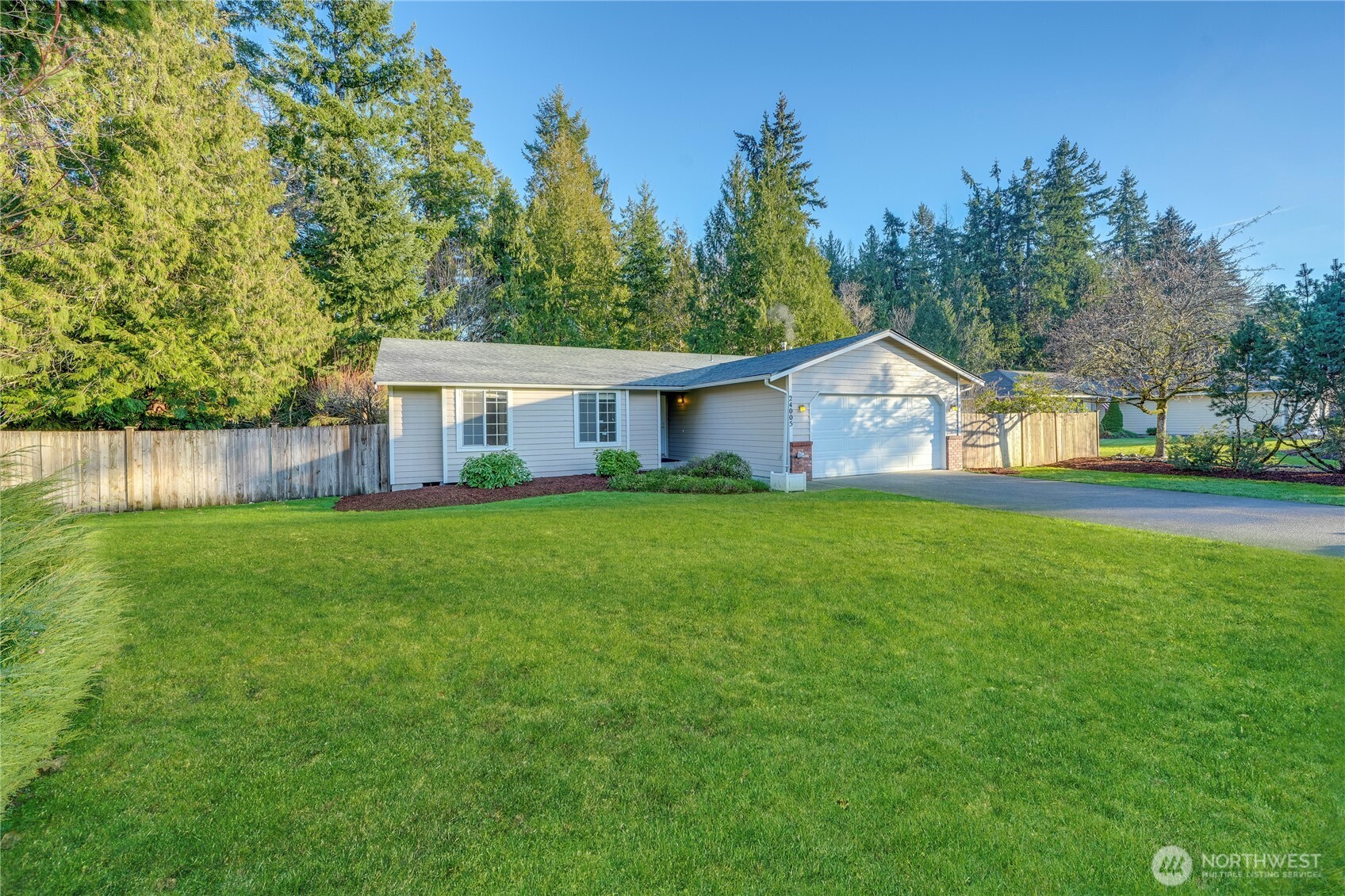 24005 72nd Avenue East Graham, WA 98338 - Photo 31 of 32 a view of a house with backyard and garden