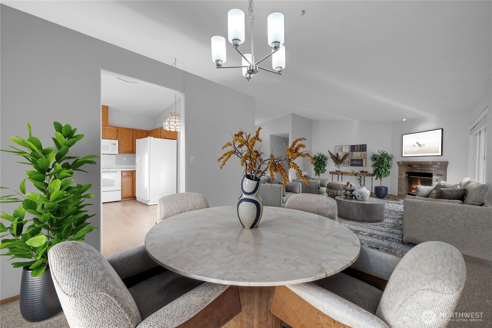 24005 72nd Avenue East Graham, WA 98338 - Photo 9 of 32 a living room with furniture and a chandelier
