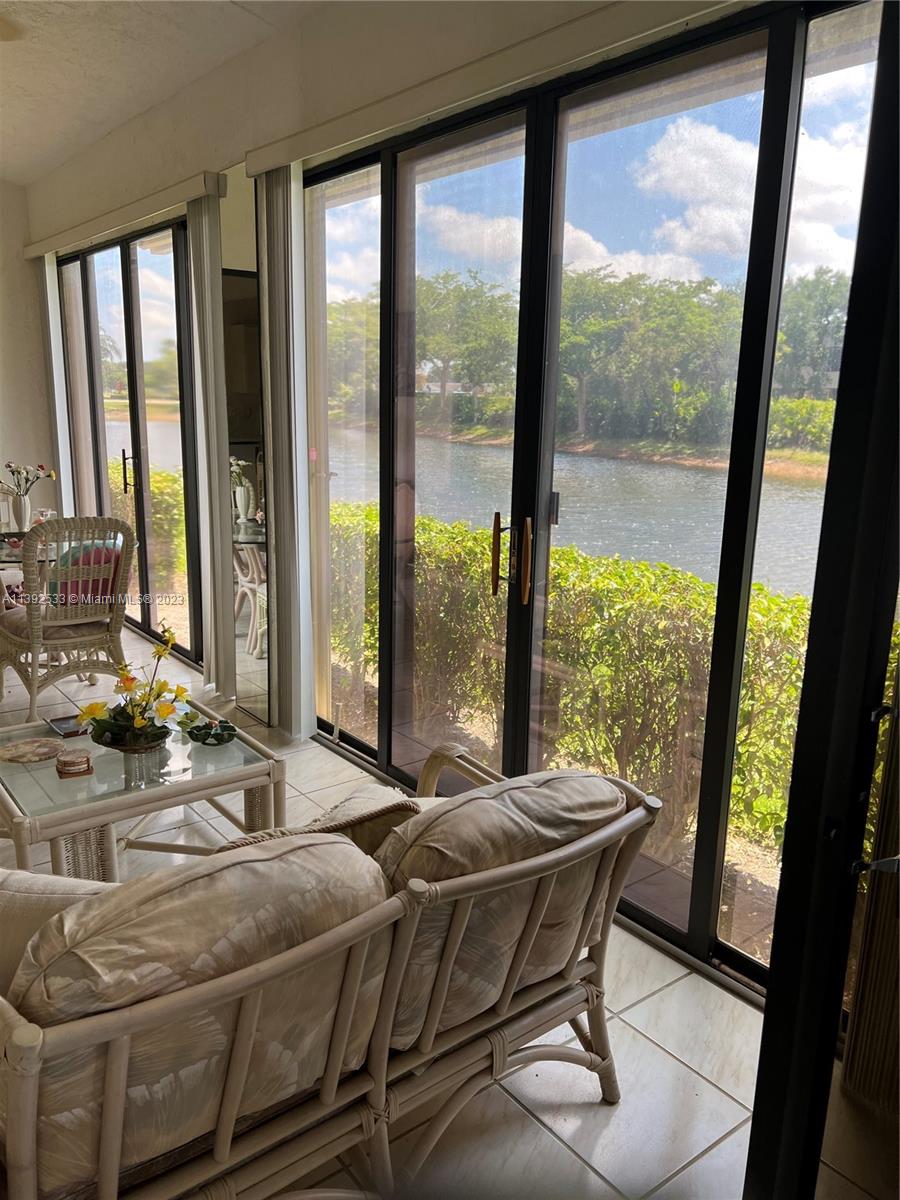 Aberdeen Boynton Beach, FL 33472 - Photo 11 of 19 a dining room with furniture and large windows