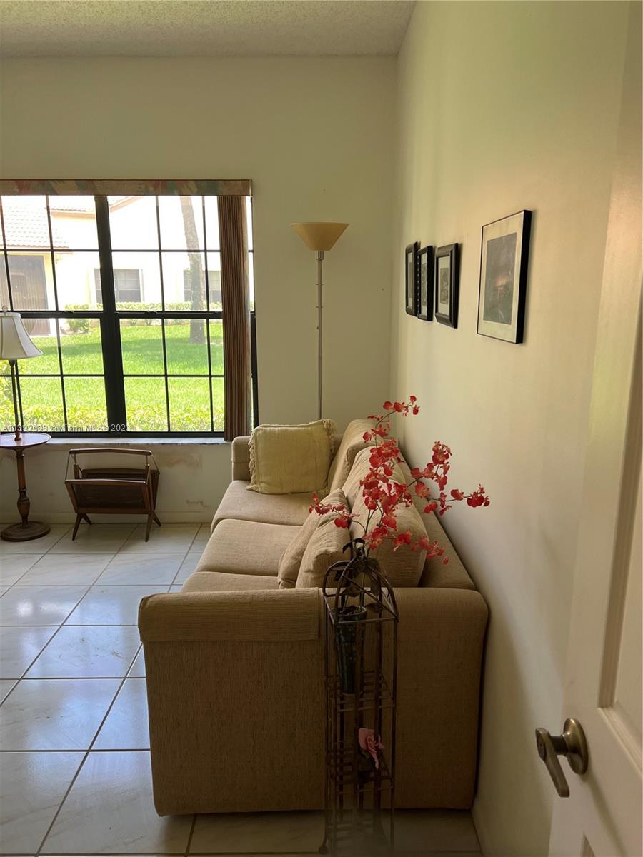 Aberdeen Boynton Beach, FL 33472 - Photo 19 of 19 a living room with furniture and a window