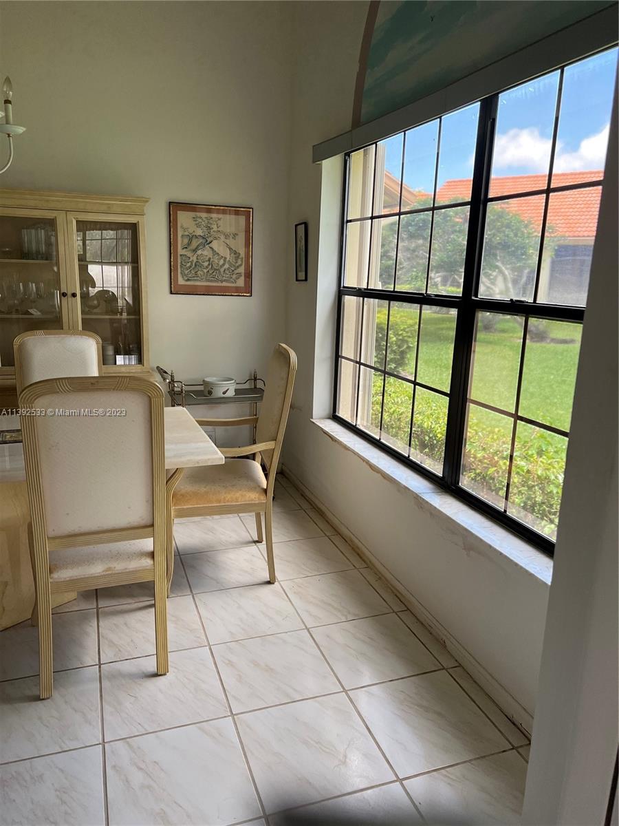 Aberdeen Boynton Beach, FL 33472 - Photo 10 of 19 a work room with furniture and a window