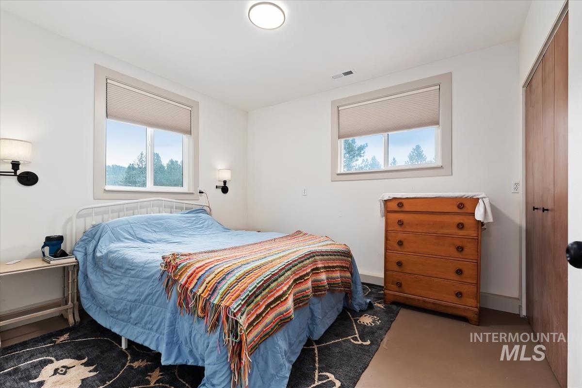 6 East Beck Road Garden Valley, ID 83622 - Photo 38 of 44 Carpeted bedroom featuring multiple windows