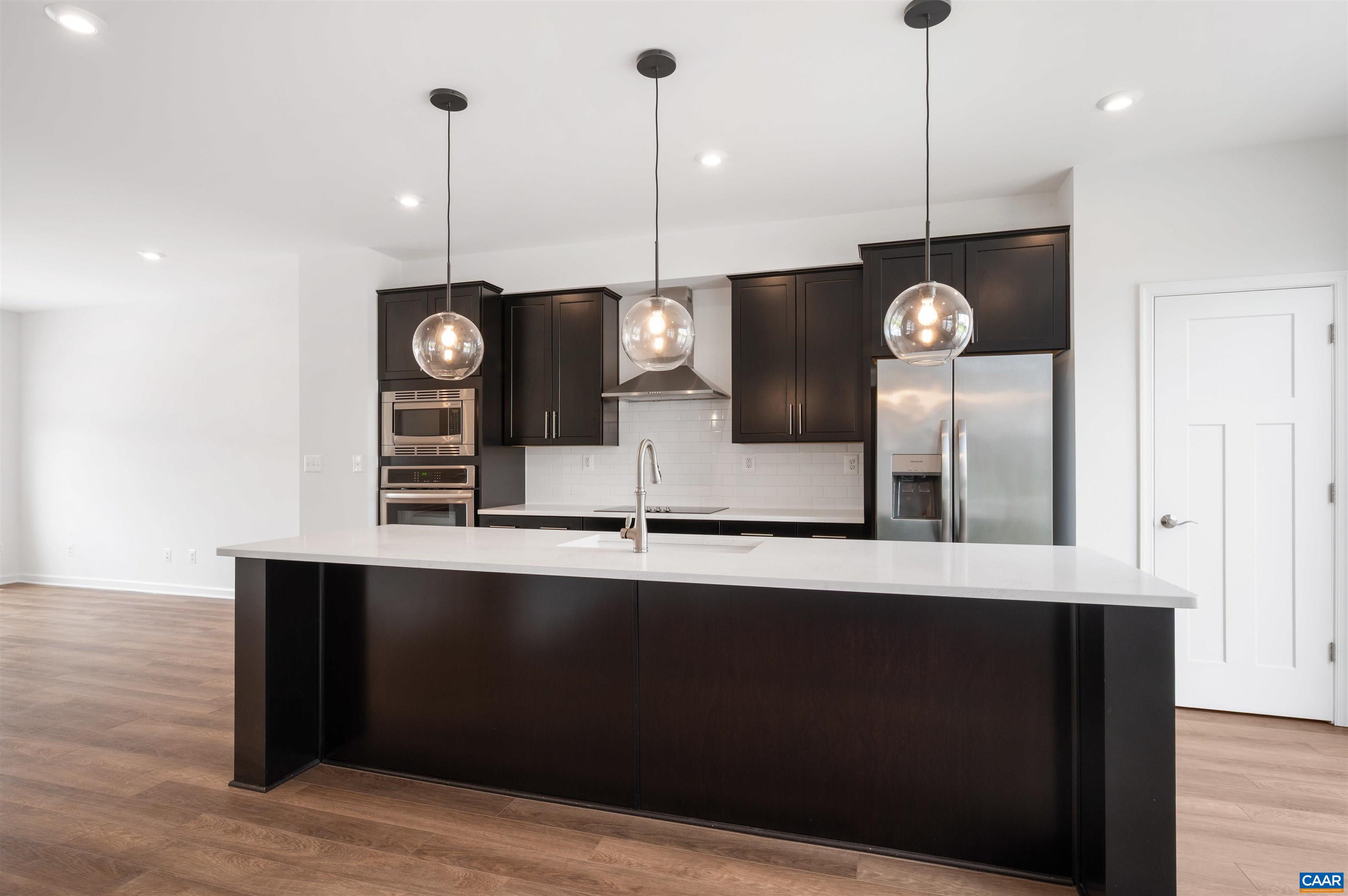 4454 Alston Street Crozet, VA 22932 - Photo 18 of 47 a view of a kitchen with an oven