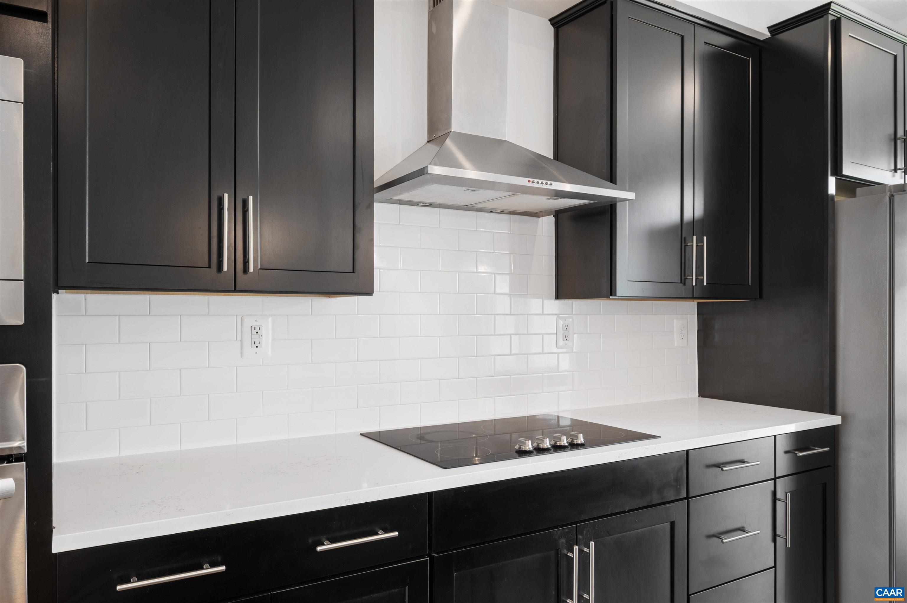 4454 Alston Street Crozet, VA 22932 - Photo 22 of 47 a kitchen with a sink and cabinets