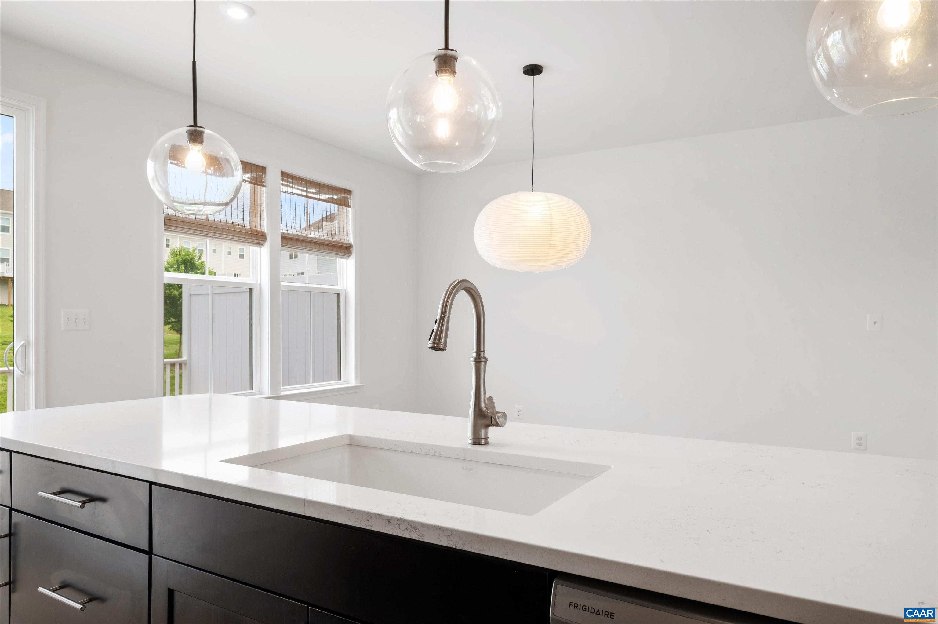4454 Alston Street Crozet, VA 22932 - Photo 23 of 47 a room with a sink and wooden floor