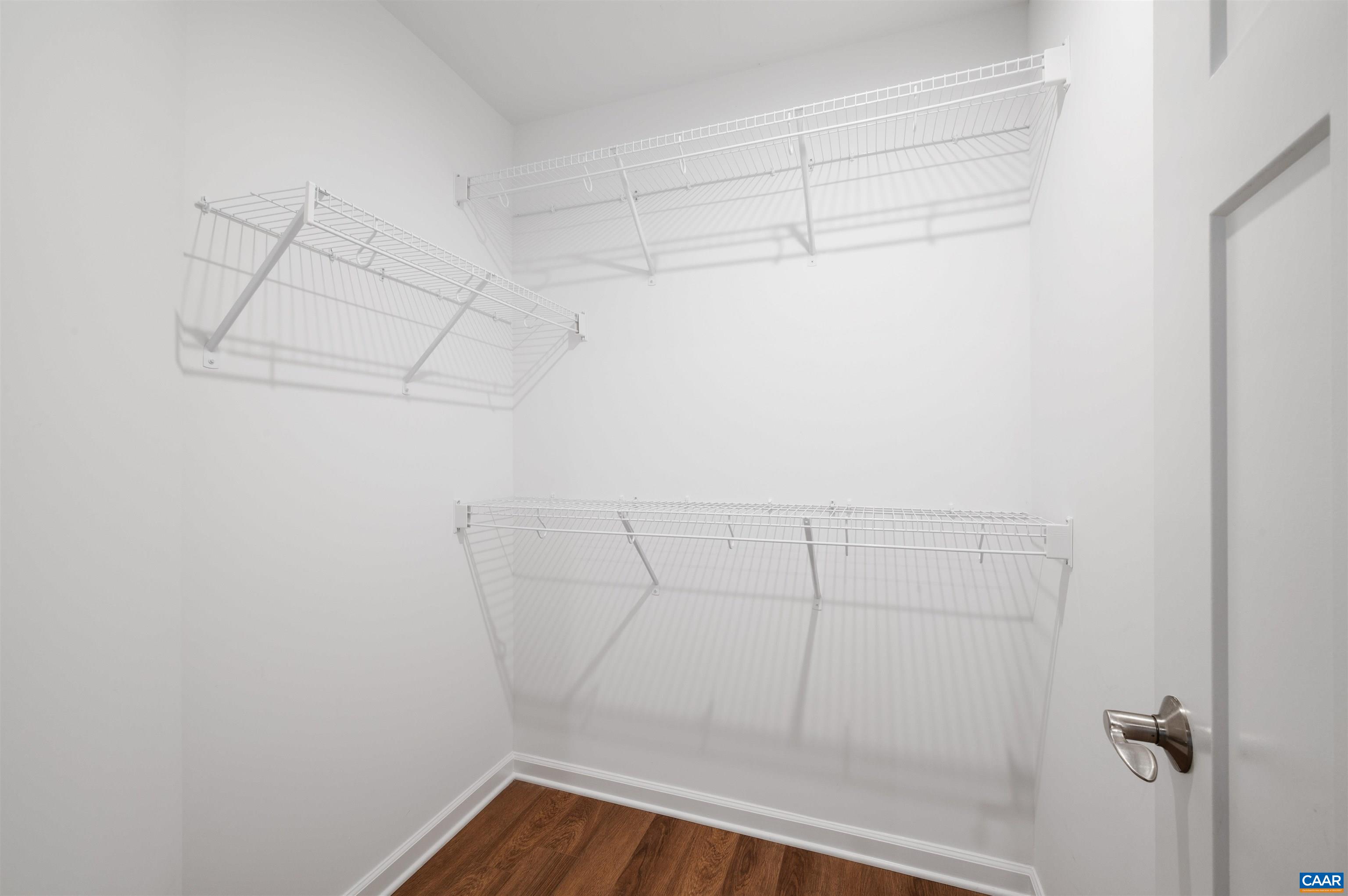 4454 Alston Street Crozet, VA 22932 - Photo 41 of 47 a view of a room with racks on the wall