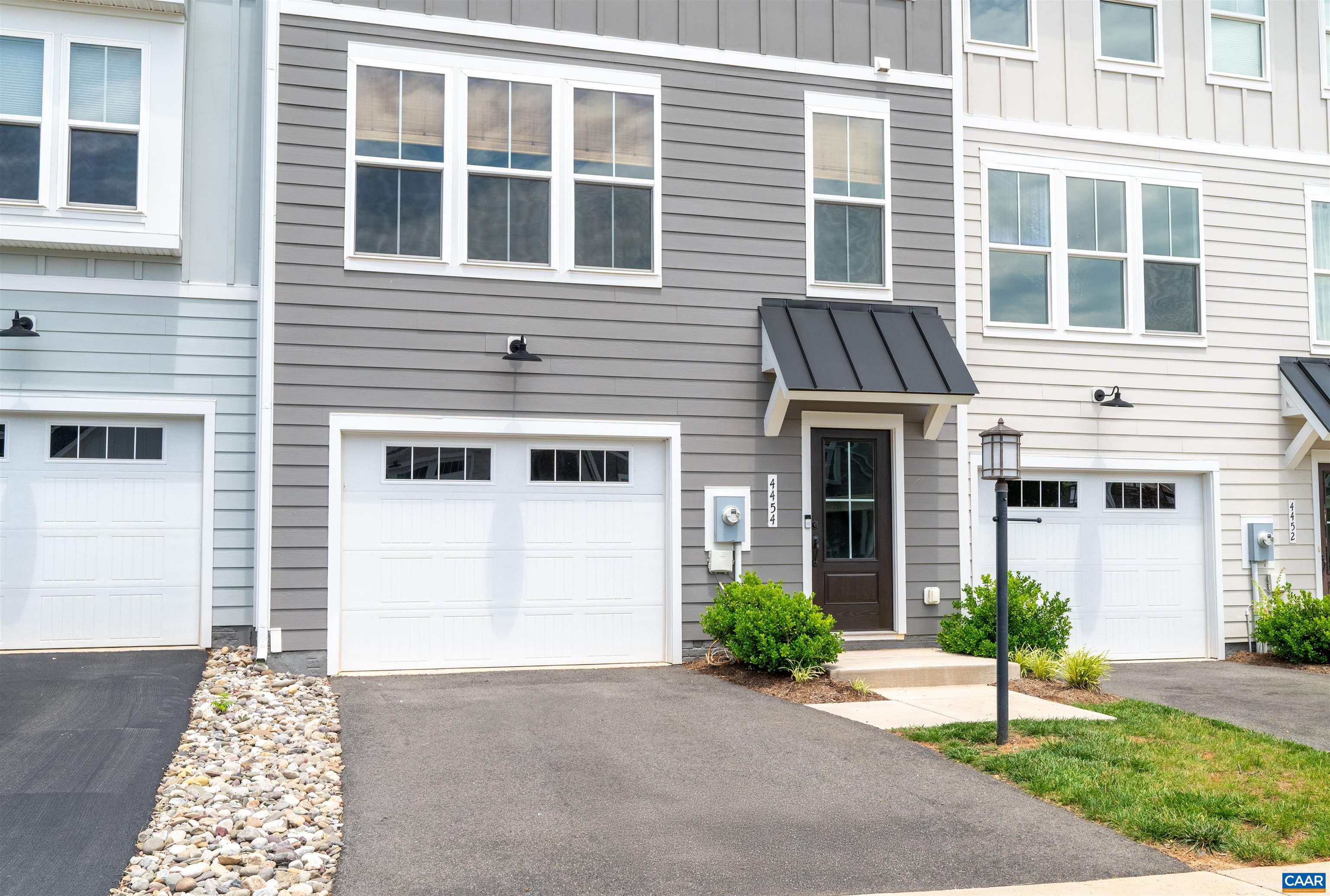 4454 Alston Street Crozet, VA 22932 - Photo 6 of 47 a view of a house with a yard and potted plants