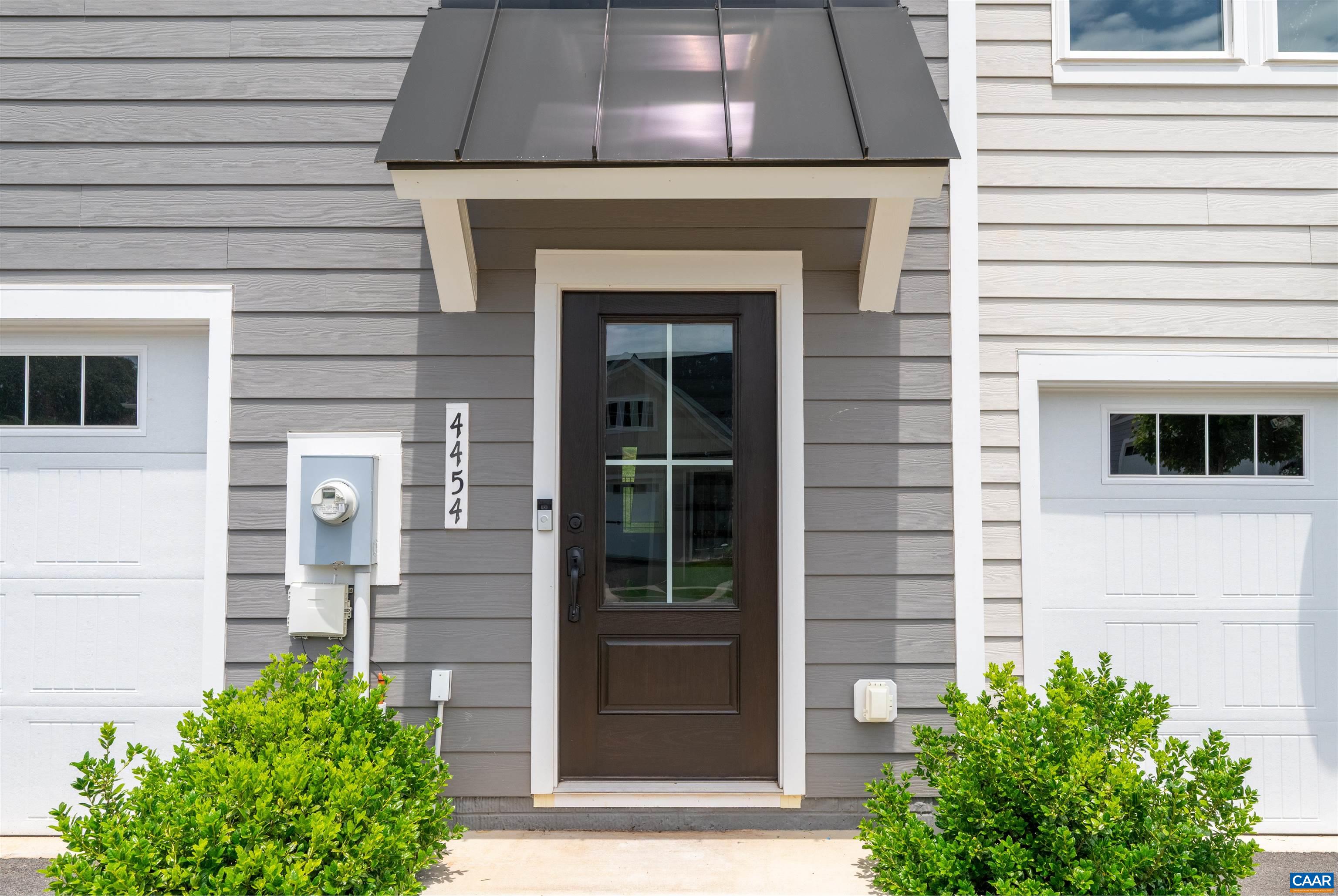 4454 Alston Street Crozet, VA 22932 - Photo 9 of 47 a front view of a house with a yard