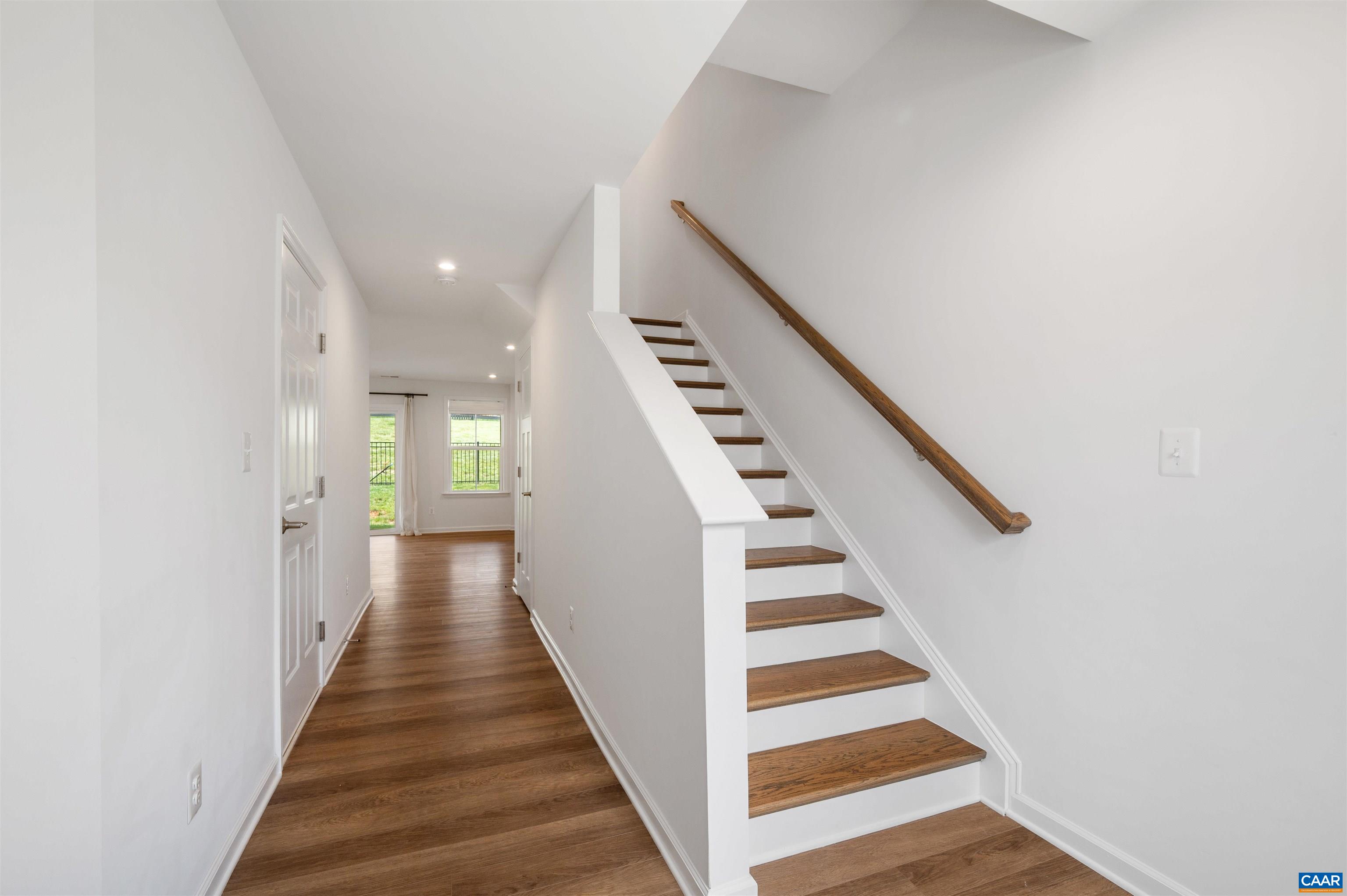 4454 Alston Street Crozet, VA 22932 - Photo 10 of 47 a view of a hallway with wooden floor and entryway