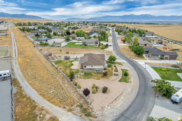 7296 Ridge Road Lake Point, UT 84074 - Photo 50 of 54 Elevated property featuring a multi-level design and a stone-clad foundation