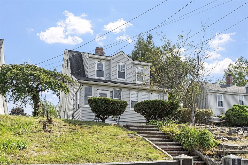 a house view with a swimming pool