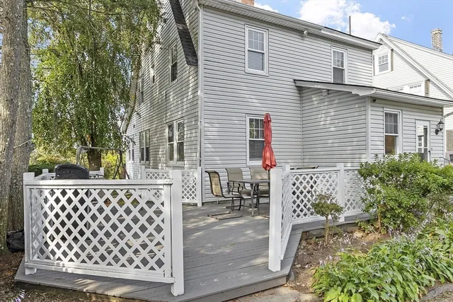 a view of a house with a bench