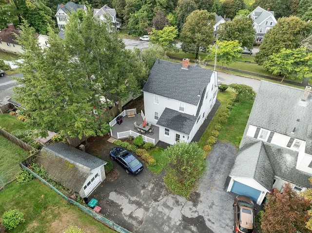 an aerial view of a house with a garden