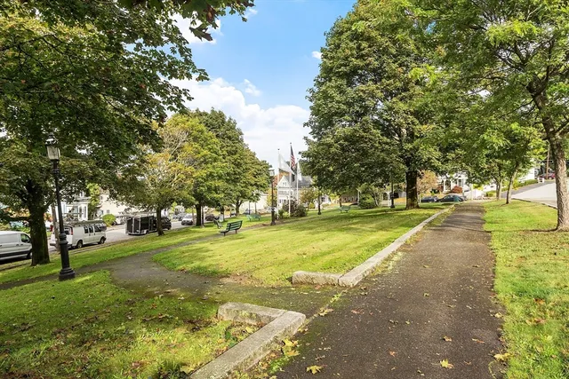 a building with trees in the background