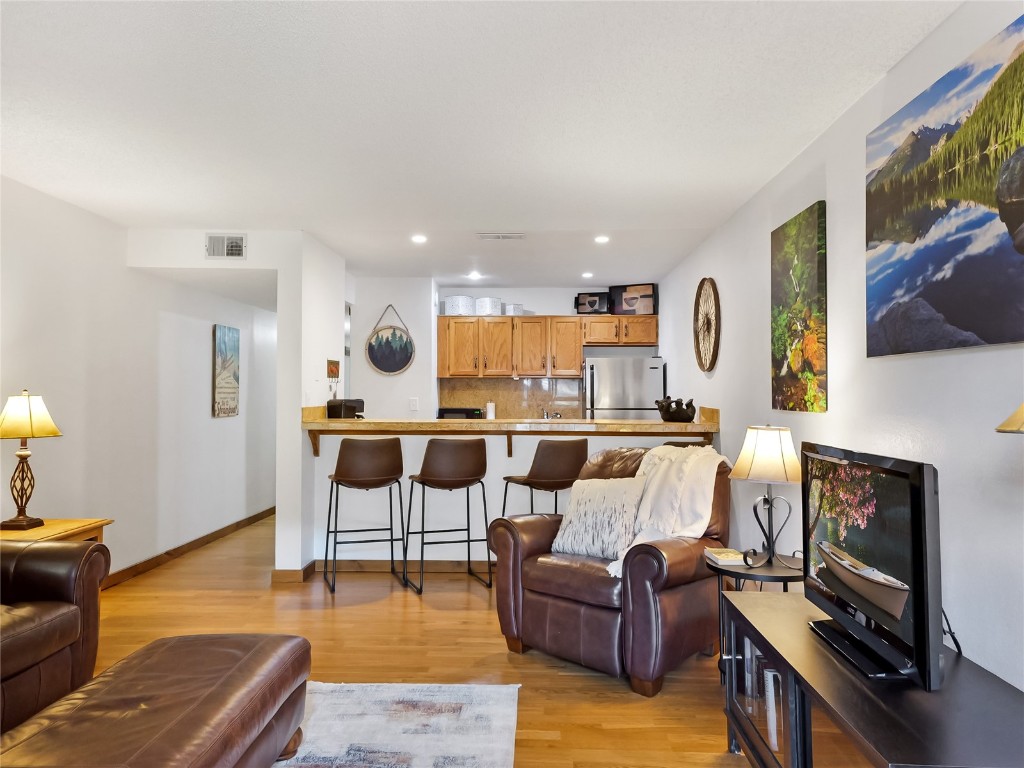 500 Bills Ranch Road, Unit 211 Frisco, CO 80443 - Photo 3 of 40 a living room with furniture and kitchen view