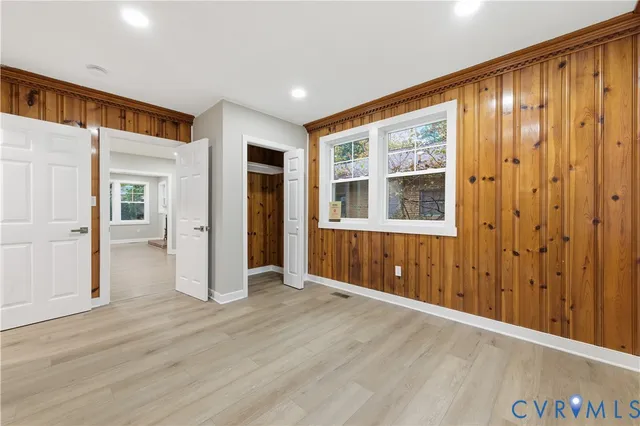 wooden floor and windows in a room
