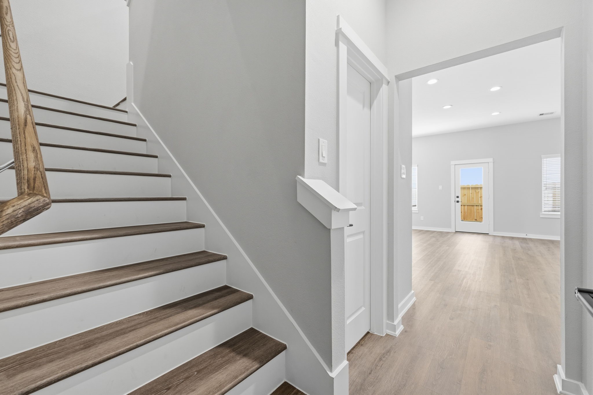 412 Stonework Landing Lane Houston, TX 77076 - Photo 11 of 30 a view of entryway and hall with wooden floor