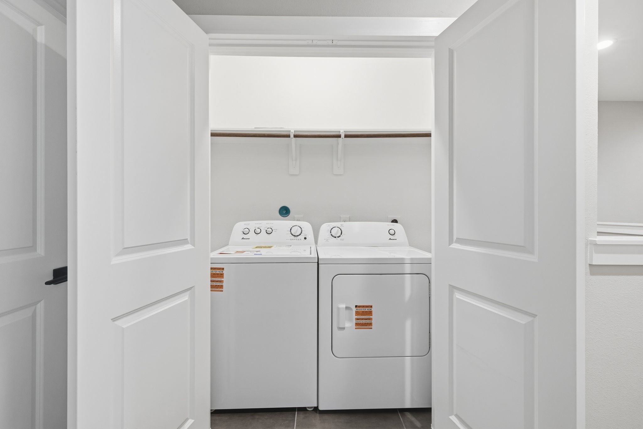 412 Stonework Landing Lane Houston, TX 77076 - Photo 19 of 30 a utility room with dryer and washer