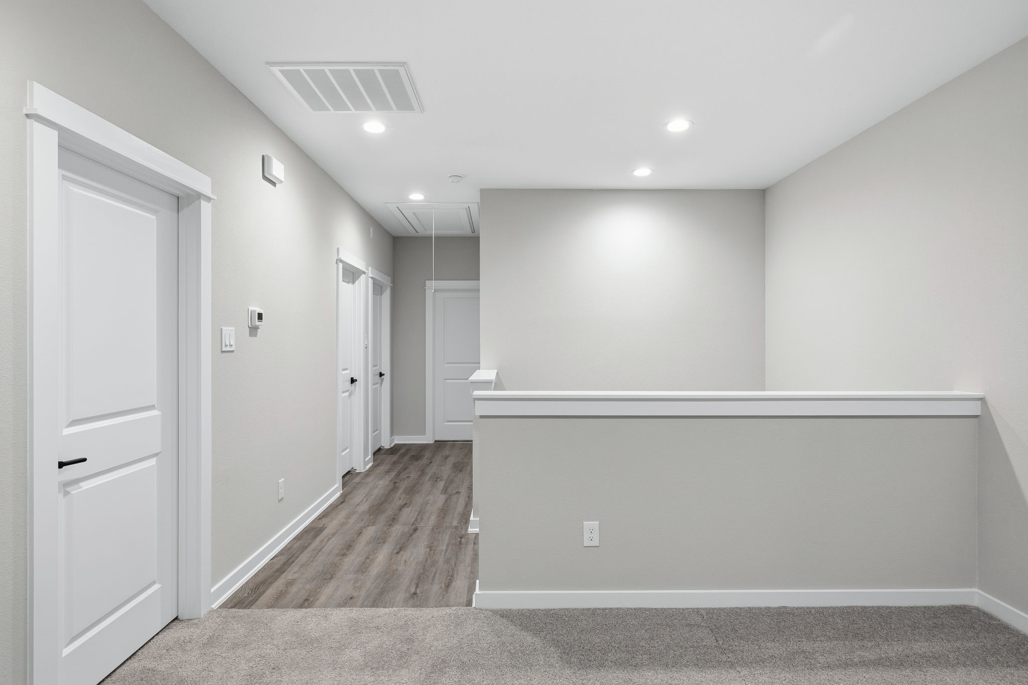 412 Stonework Landing Lane Houston, TX 77076 - Photo 21 of 30 a view of hallway with stairs