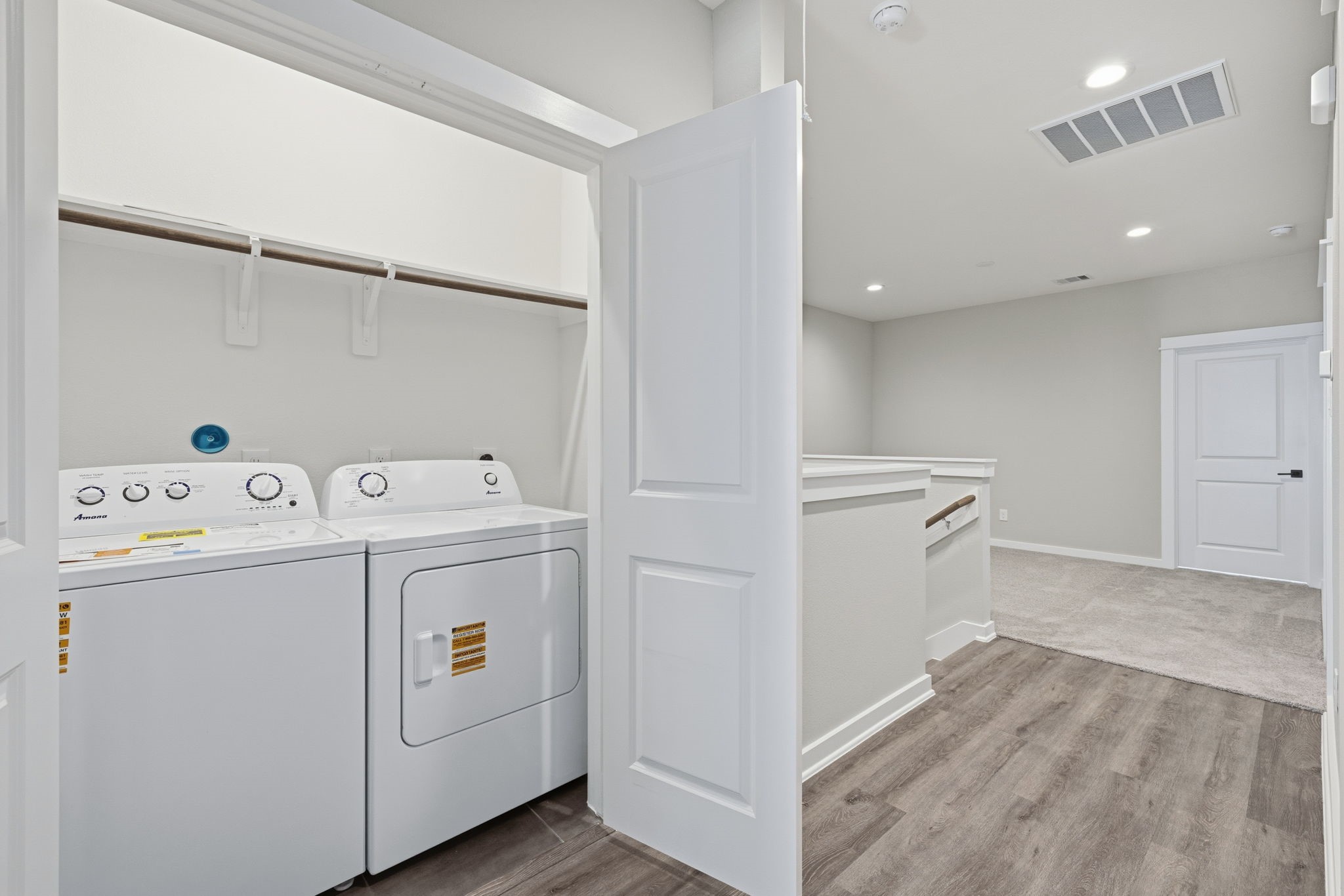 412 Stonework Landing Lane Houston, TX 77076 - Photo 23 of 30 a view of storage and utility room with washer and dryer