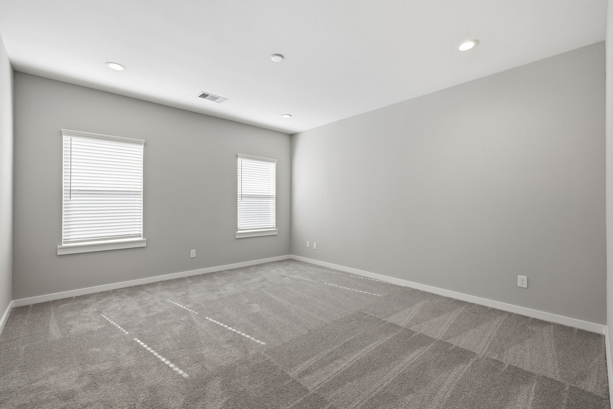 412 Stonework Landing Lane Houston, TX 77076 - Photo 25 of 30 an empty room with windows