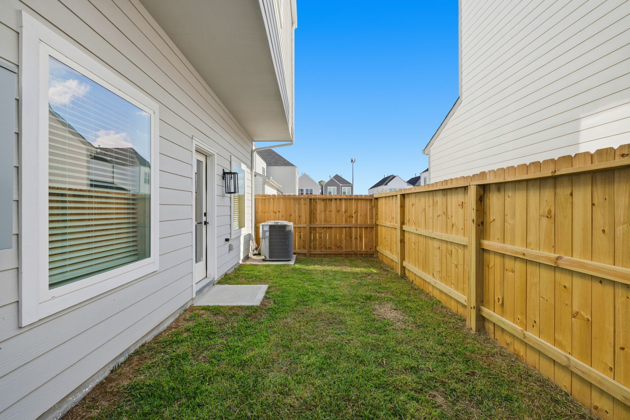 412 Stonework Landing Lane Houston, TX 77076 - Photo 30 of 30 a view of a backyard with sitting area