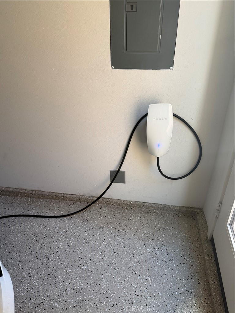 32703 Brunello Way Temecula, CA 92591 - Photo 15 of 26 a view of a room with wooden floor and cabinets