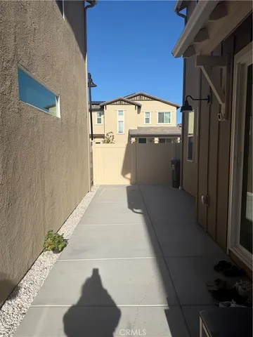 a view of a building with sitting area