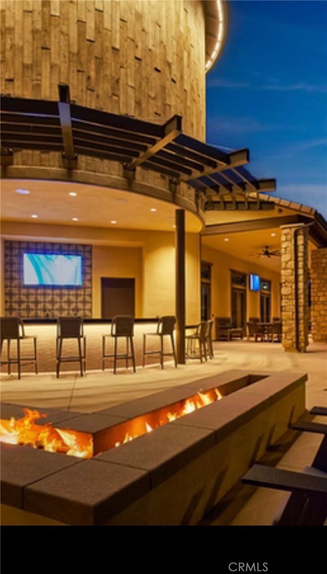 32703 Brunello Way Temecula, CA 92591 - Photo 20 of 26 a view of a building with sitting area