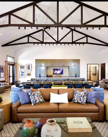 a view of a swimming pool with furniture