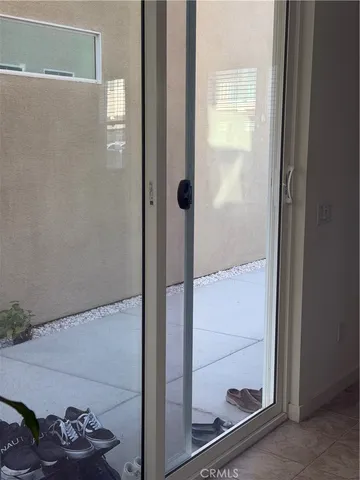 a bathroom with a glass shower door