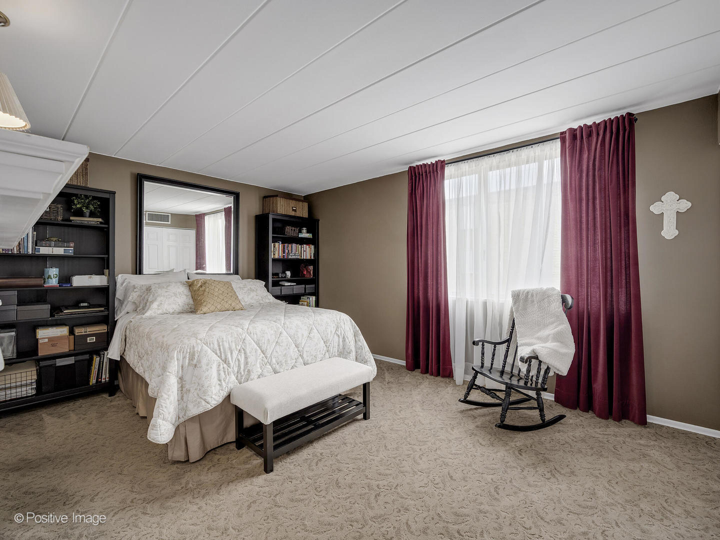 100 West Butterfield Road, Unit 401N Elmhurst, IL 60126 - Photo 17 of 29 a spacious bedroom with a bed and a walk in closet