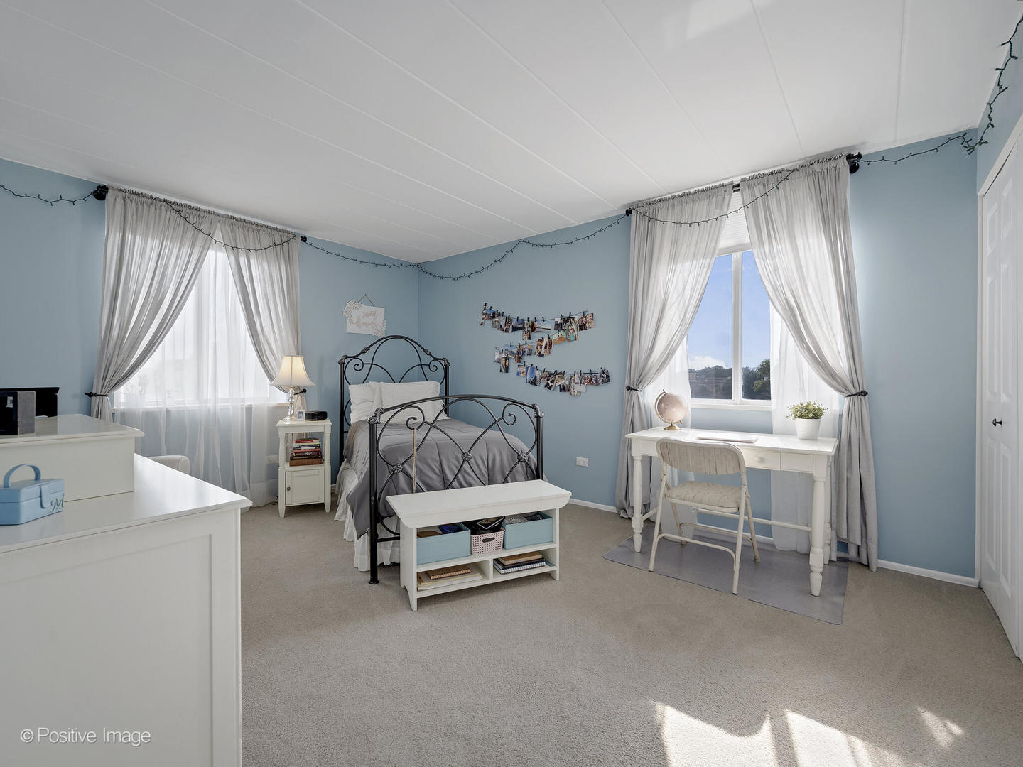 100 West Butterfield Road, Unit 401N Elmhurst, IL 60126 - Photo 20 of 29 a bedroom with furniture and a window