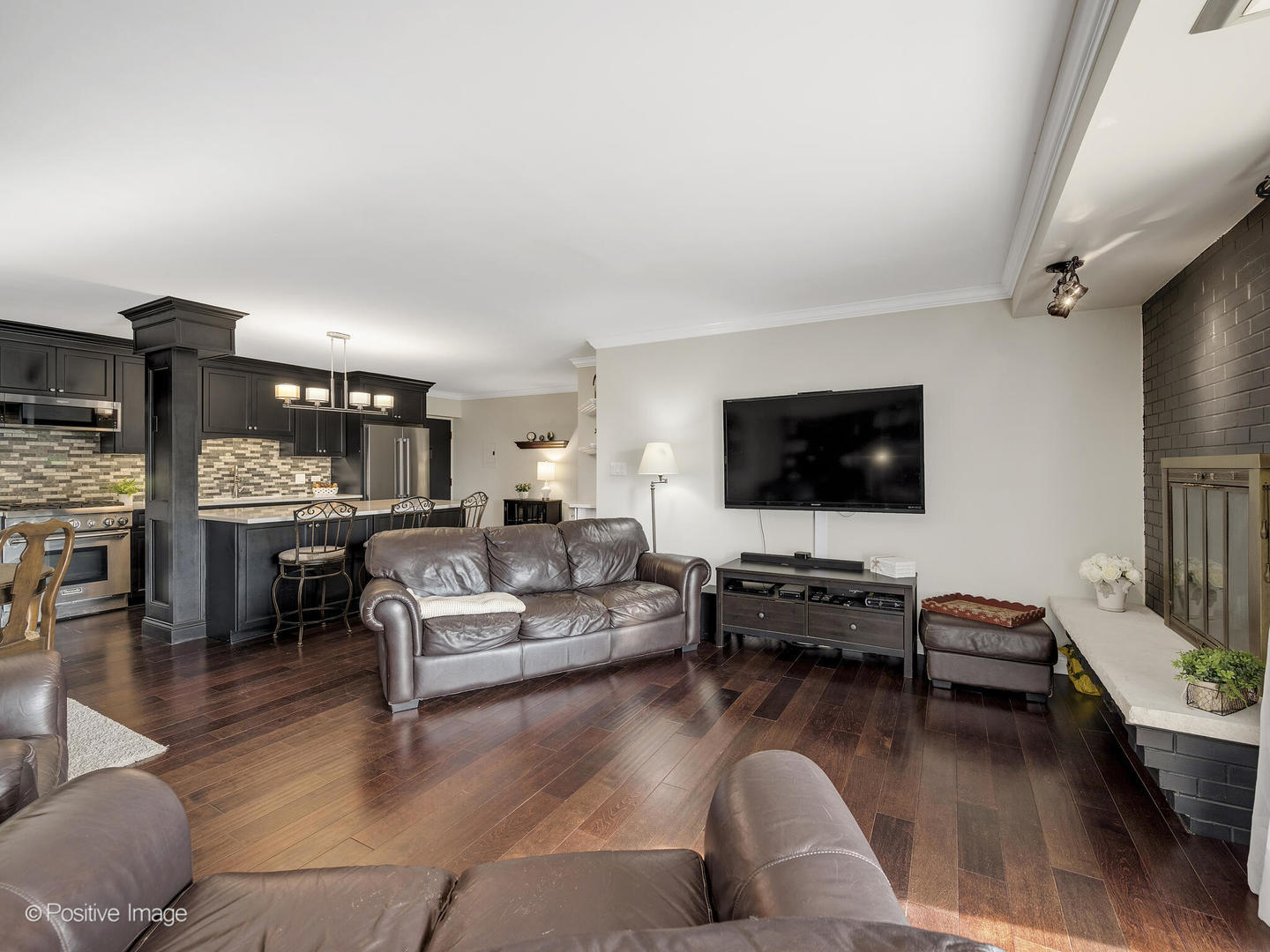 100 West Butterfield Road, Unit 401N Elmhurst, IL 60126 - Photo 8 of 29 a living room with furniture and a flat screen tv