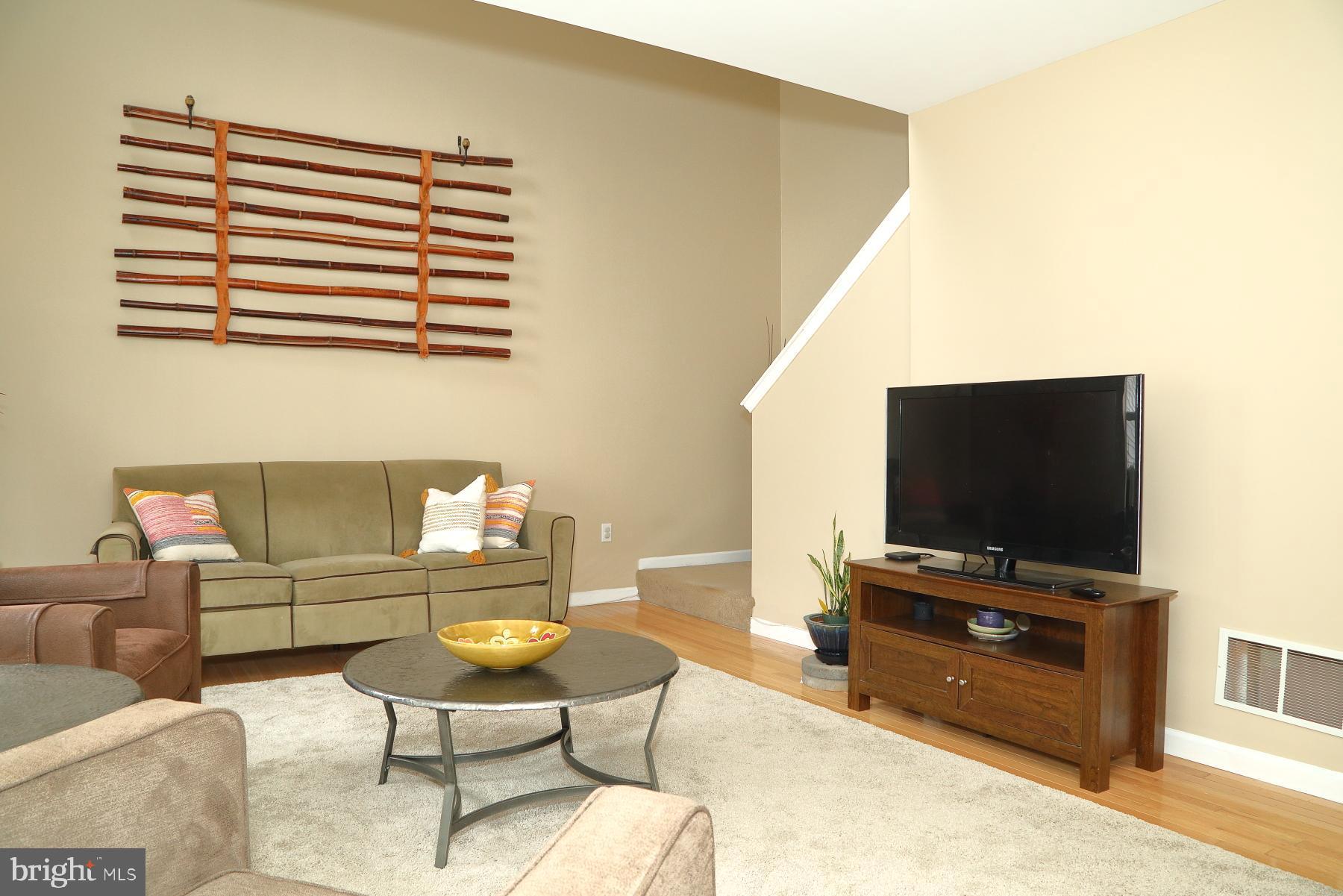 1049 Kent Garden Lititz, PA 17543 - Photo 17 of 29 a living room with furniture and a flat screen tv