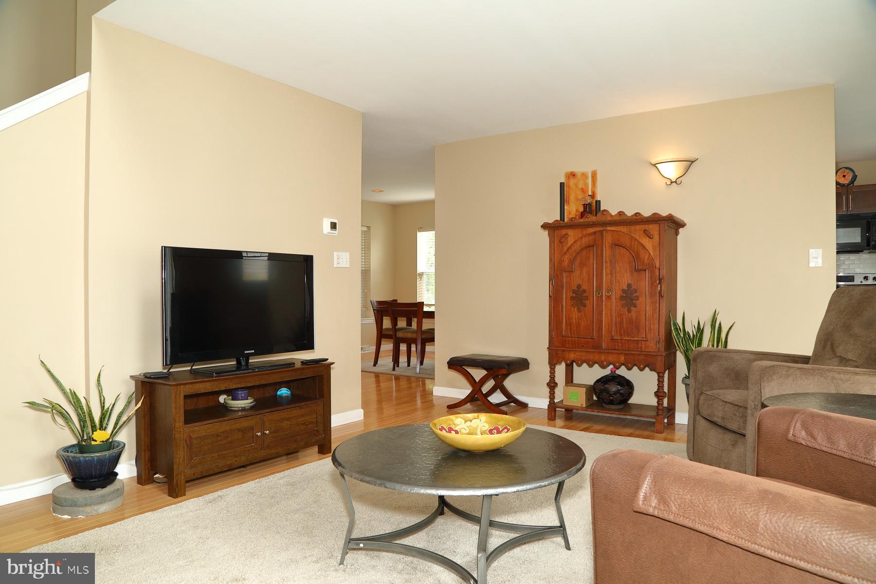 1049 Kent Garden Lititz, PA 17543 - Photo 20 of 29 a living room with furniture and a flat screen tv