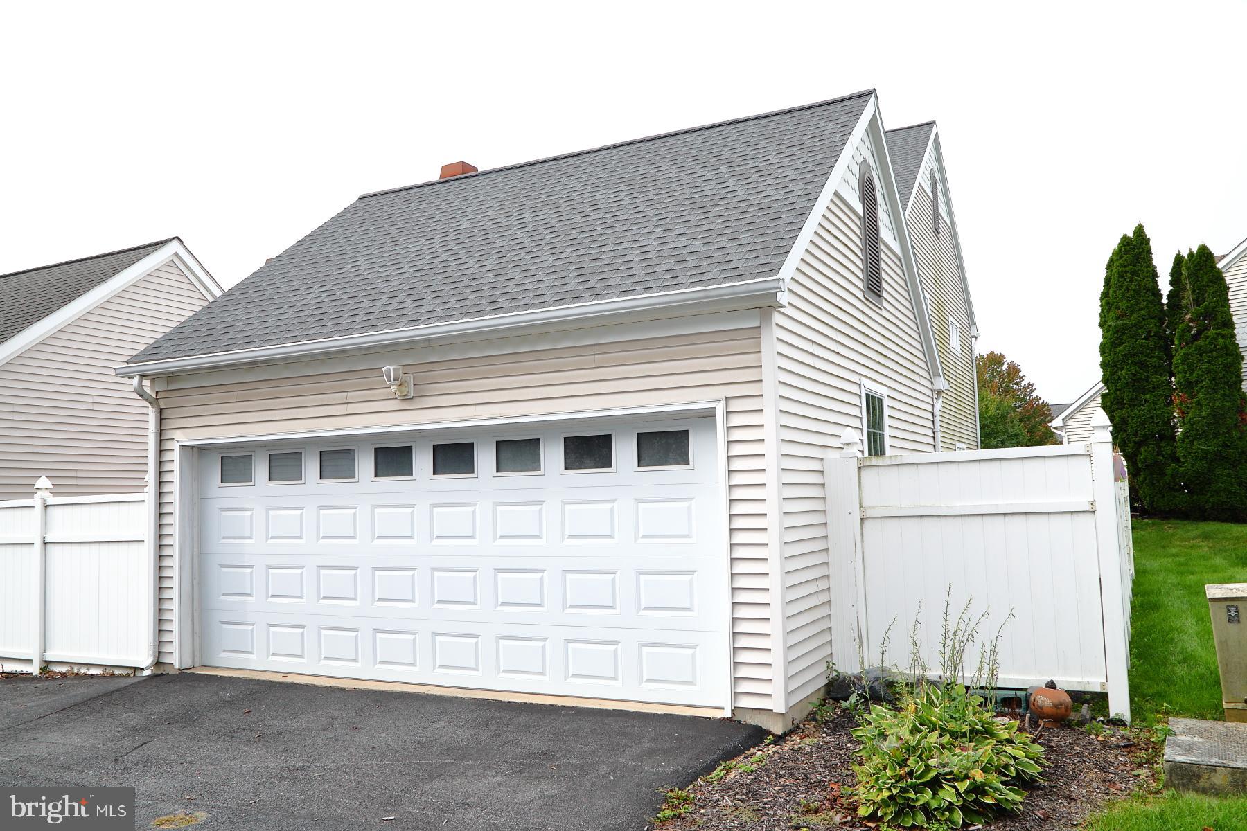 1049 Kent Garden Lititz, PA 17543 - Photo 2 of 29 a view of a house with a garage