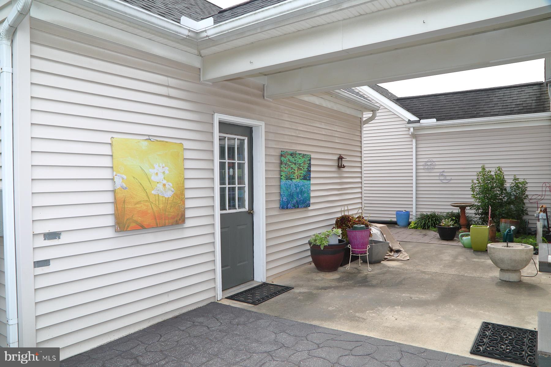 1049 Kent Garden Lititz, PA 17543 - Photo 3 of 29 a view of sitting area with furniture and a chair