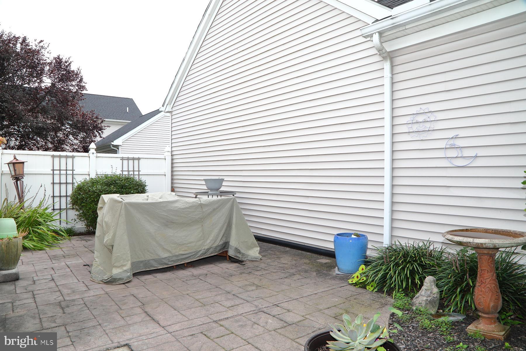 1049 Kent Garden Lititz, PA 17543 - Photo 4 of 29 a view of a back yard from a patio