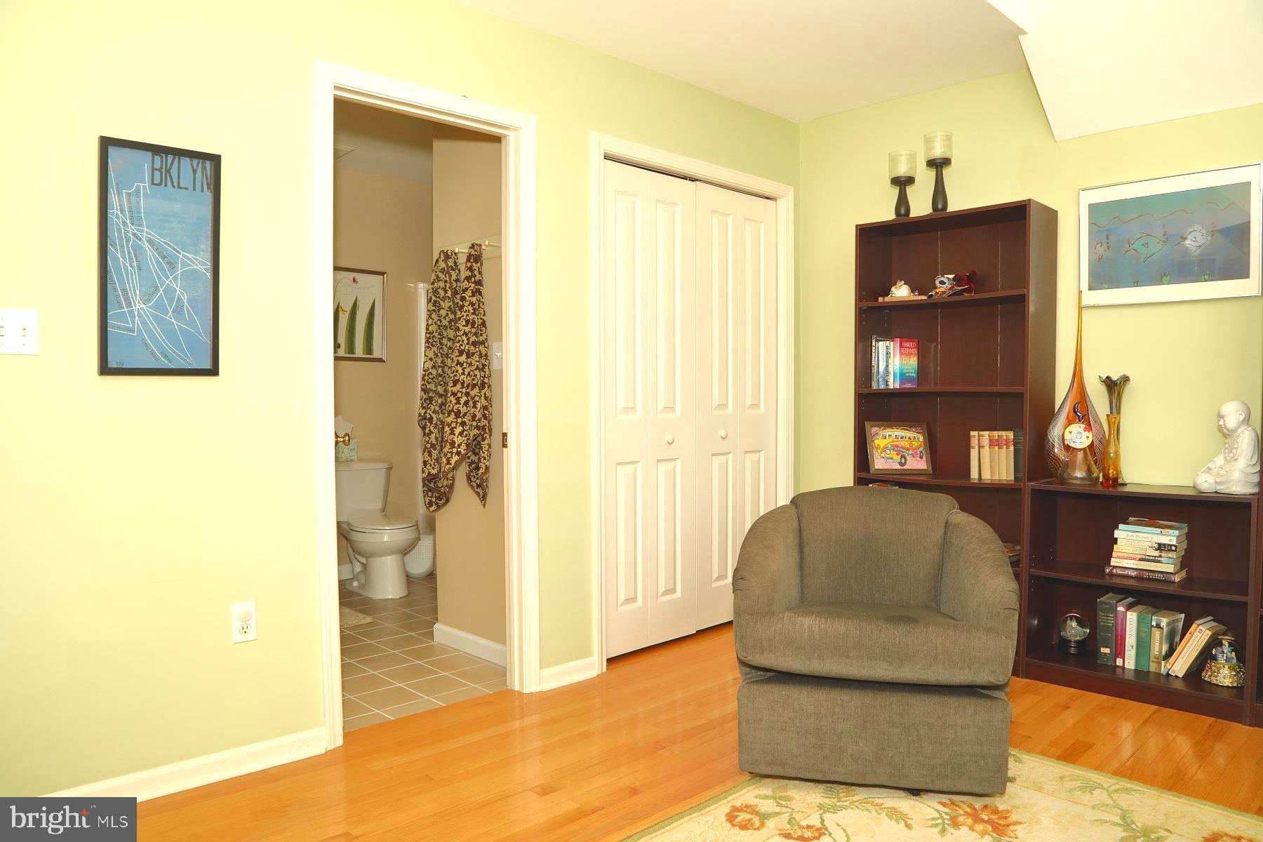 1049 Kent Garden Lititz, PA 17543 - Photo 8 of 29 a living room with furniture and a floor to ceiling window