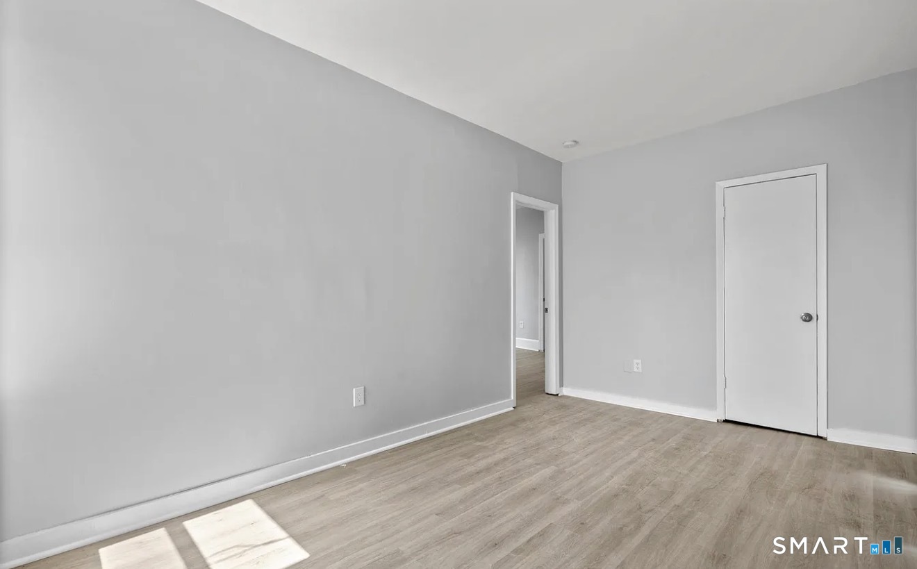 25 Whittier Street Bridgeport, CT 06605 - Photo 6 of 12 a view of an empty room and window
