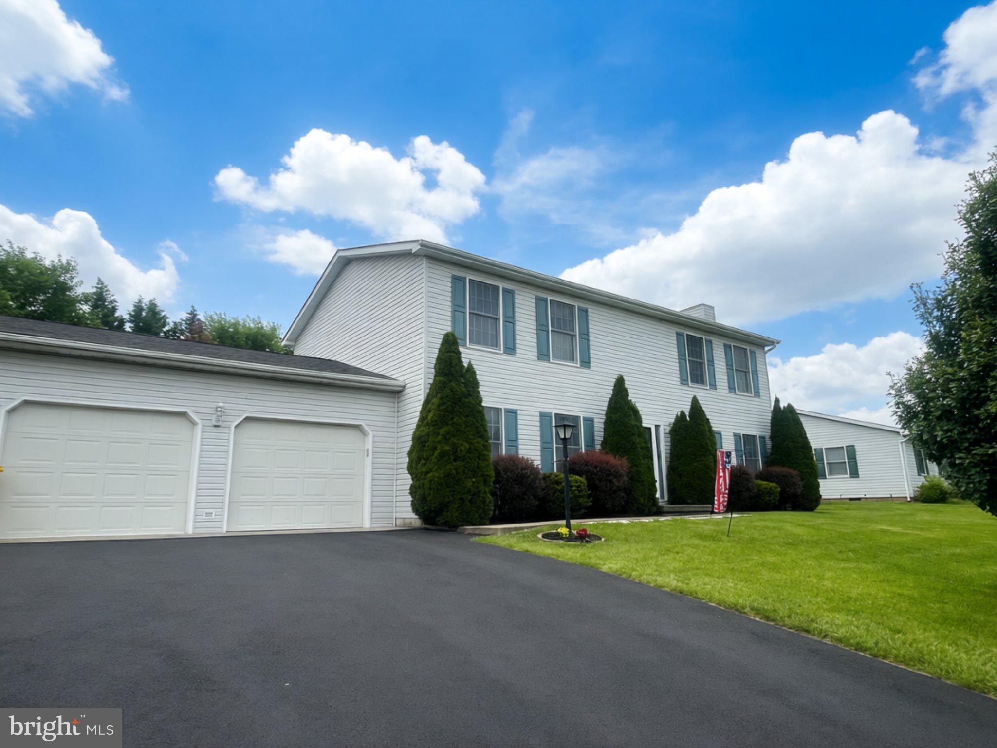 64 Ralphs Court Martinsburg, WV 25404 - Photo 1 of 8 Charming home with lush greenery.