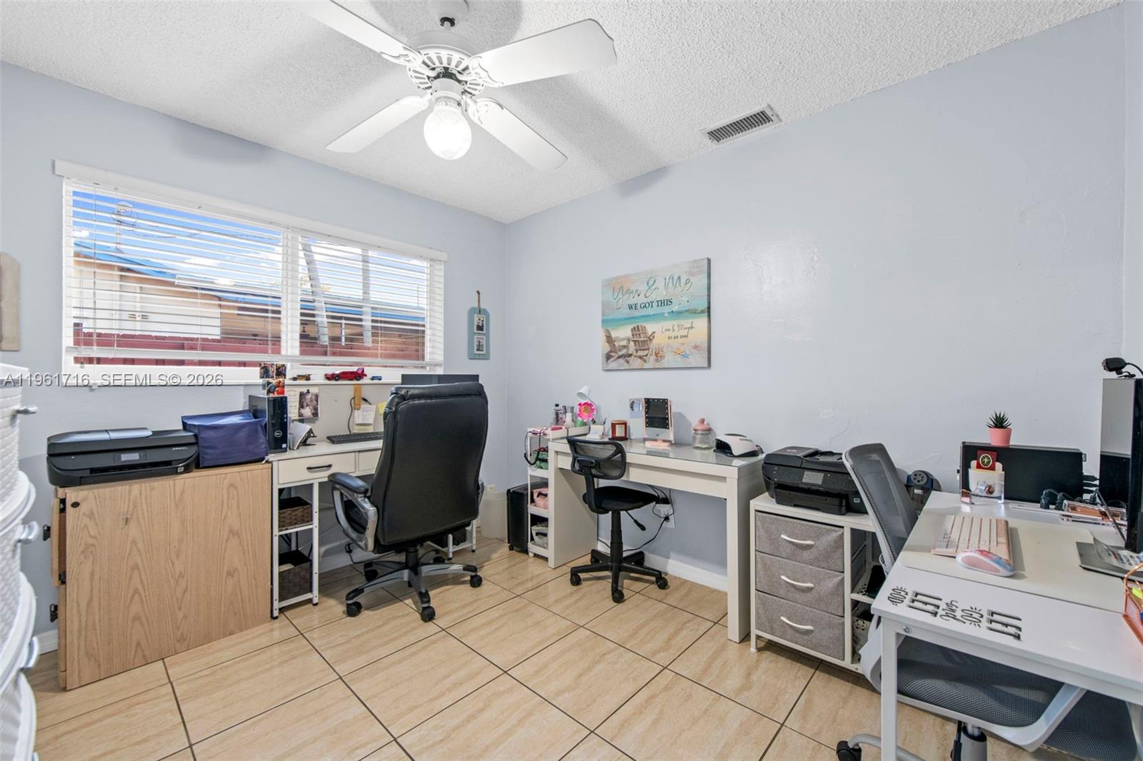 1916 North 36th Avenue Hollywood, FL 33021 - Photo 17 of 22 a view of a workspace with furniture and a window