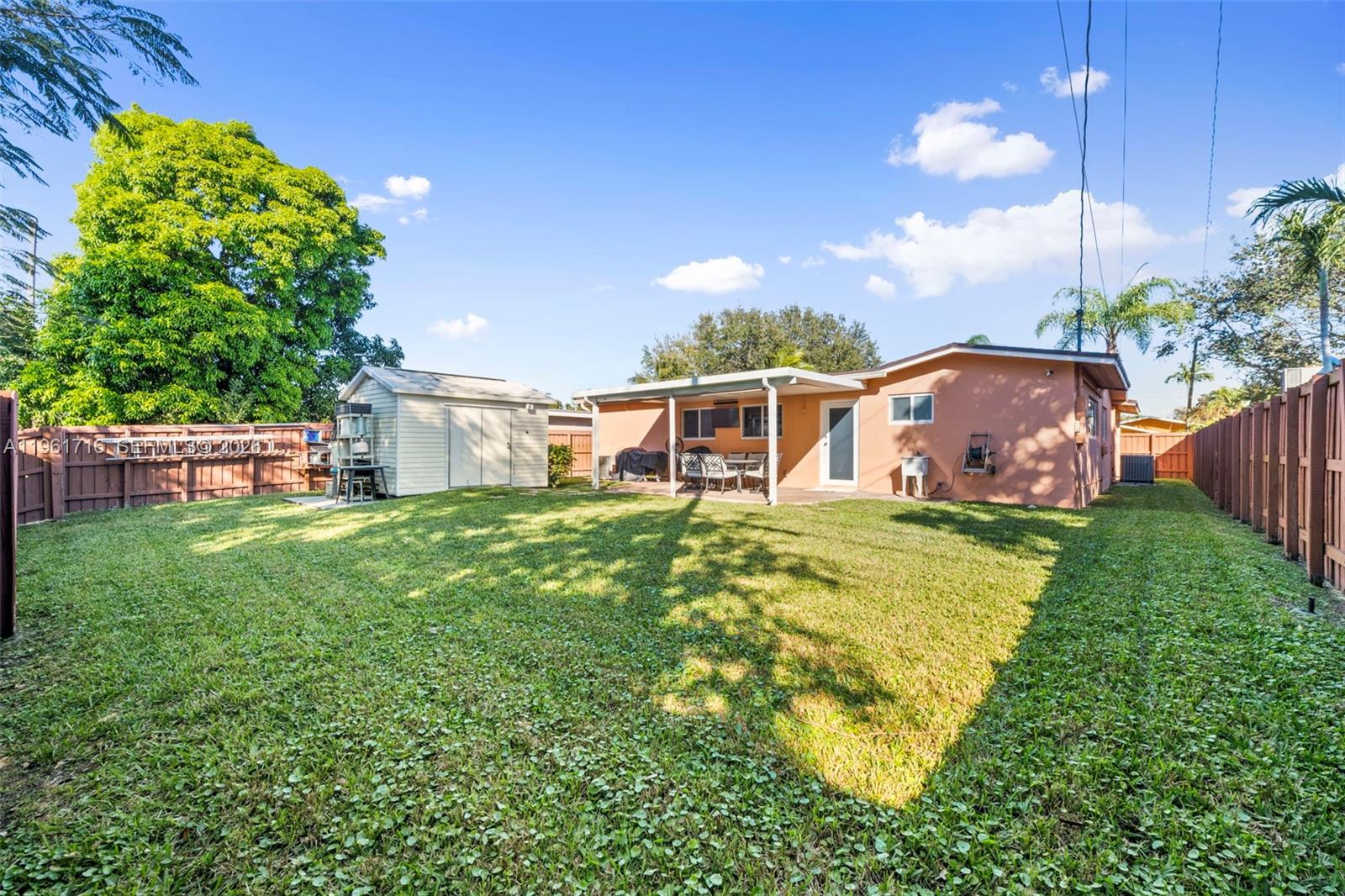 1916 North 36th Avenue Hollywood, FL 33021 - Photo 19 of 22 a view of a house with a backyard