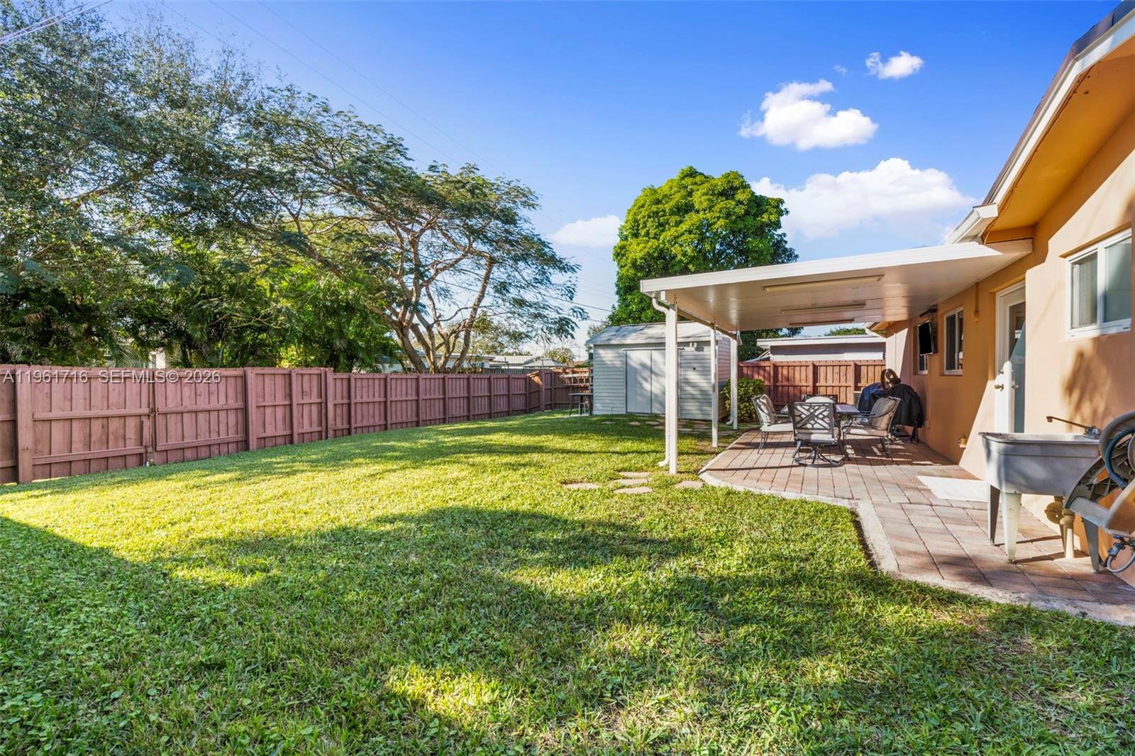 1916 North 36th Avenue Hollywood, FL 33021 - Photo 20 of 22 a view of a backyard with swimming pool