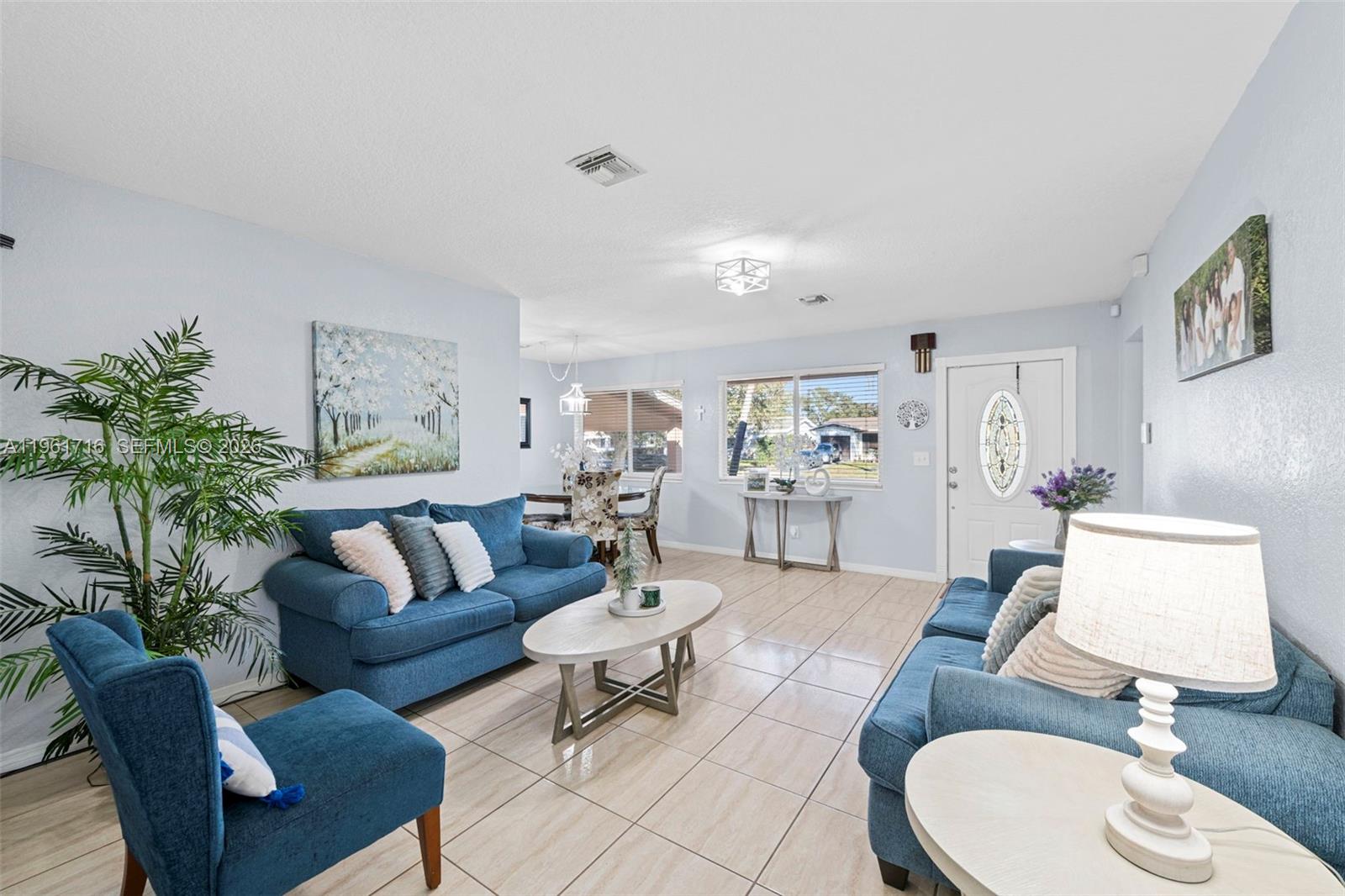 1916 North 36th Avenue Hollywood, FL 33021 - Photo 5 of 22 a living room with furniture and wooden floor